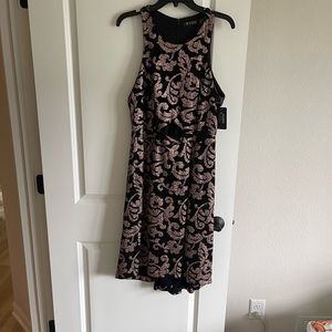 NWT- Guess Foiled jacquard patterned dress with a cutout, fun and flirty